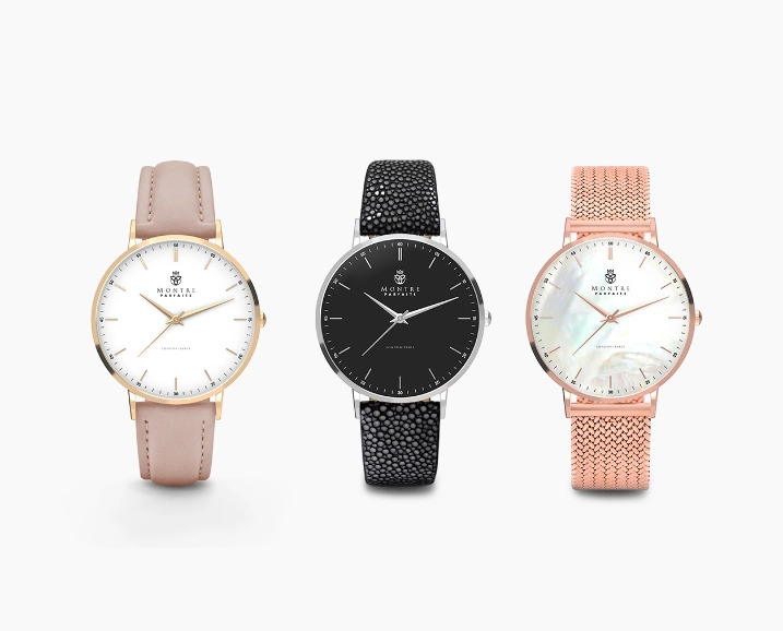 Realistic renders of pink, black and rose gold luxury Montre Parfaite watches on white background