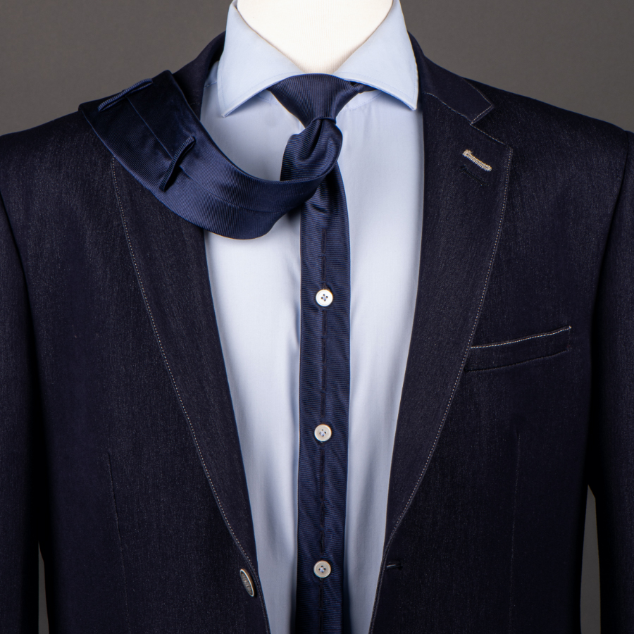 Prototype of MakTie buttoned safety tie on manakin suit