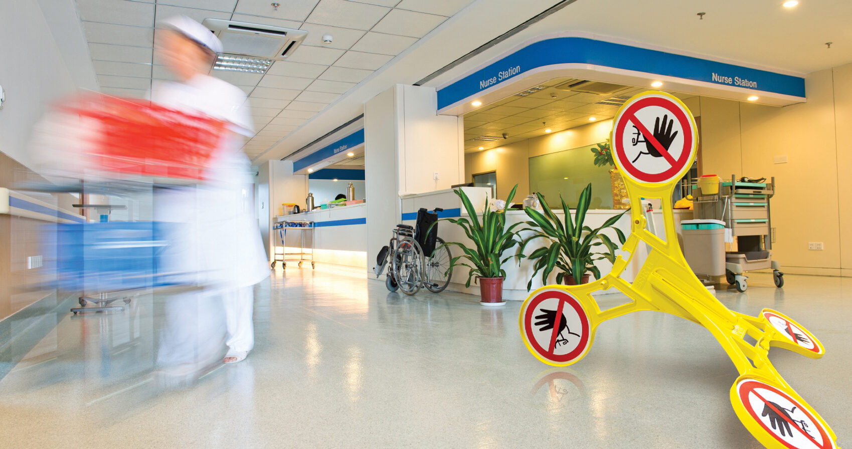 Yellow industrial safety signage by Seton shown in a healthcare medical environment
