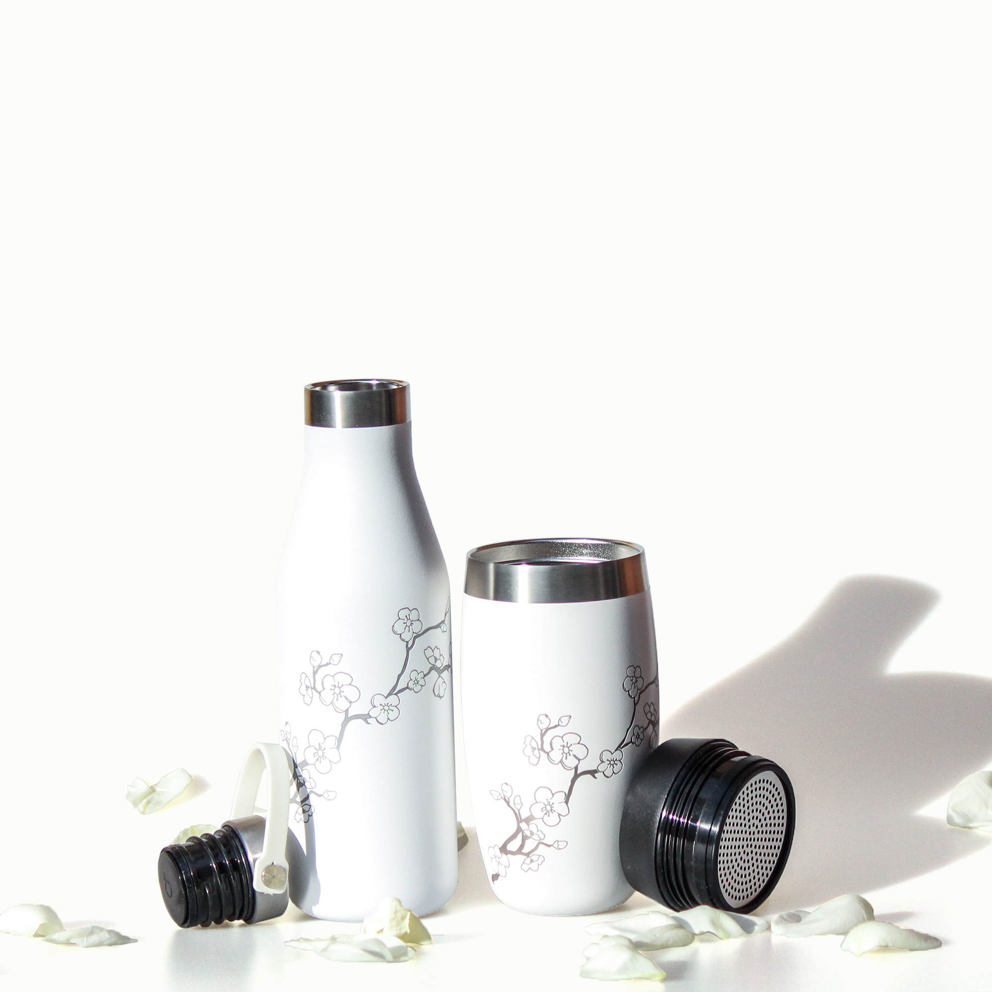 Cherry blossom Ohelo sustainable bottle and tumbler for consumers designed by Simple Design Works in Hereford