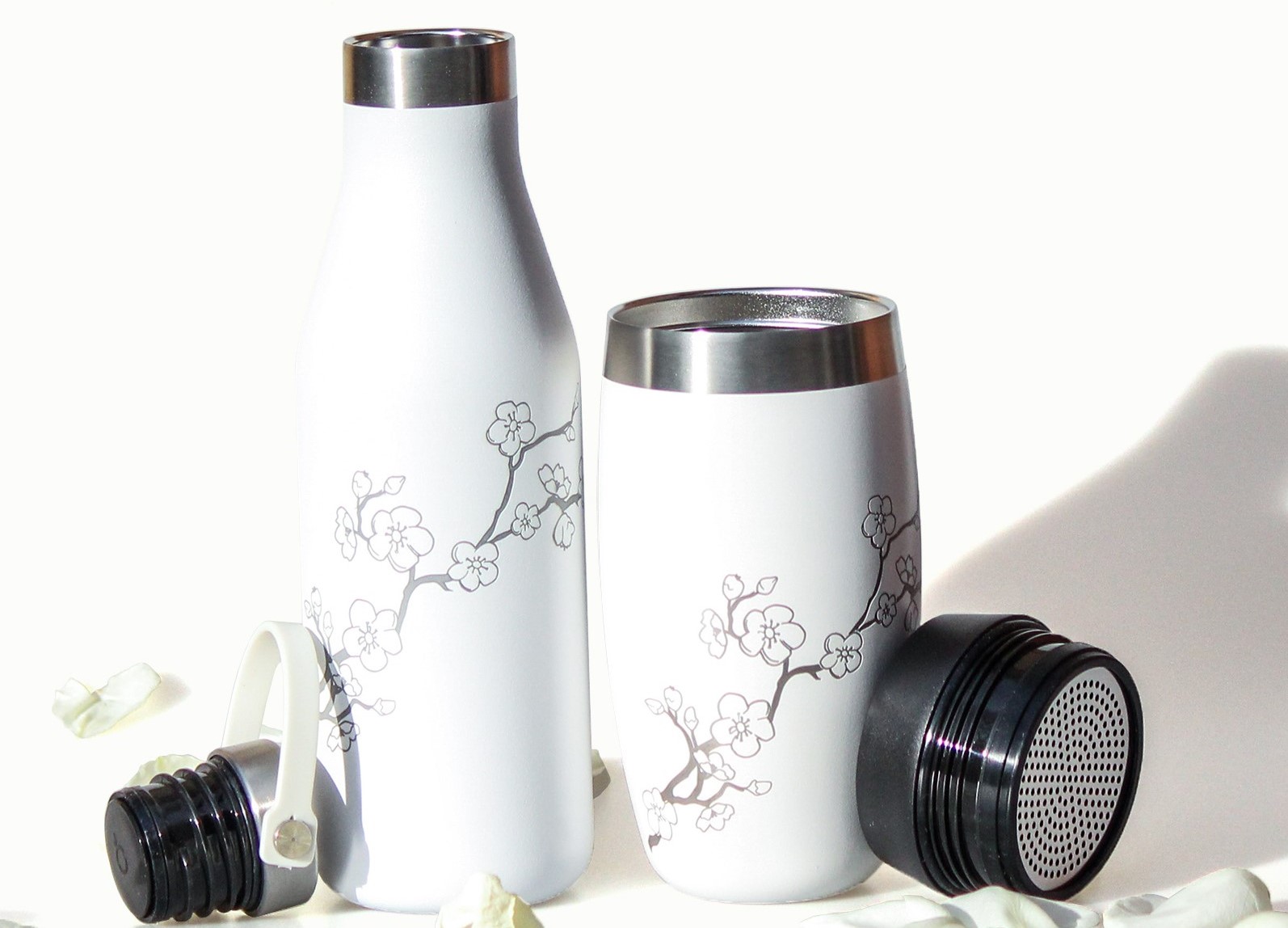 Cherry blossom Ohelo sustainable bottle and tumbler for consumers designed by Simple Design Works in West Midlands